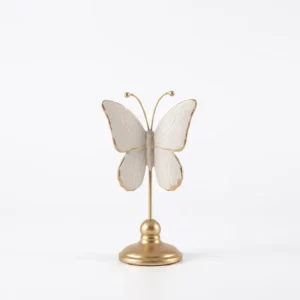 AD2212-1D | Mariposa blanca con borde dorado sobre pedestal